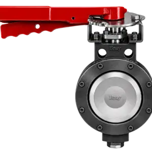 Red lever handle of industrial valve actuator mounted on a Bray-style gear assembly; controls a large valve.